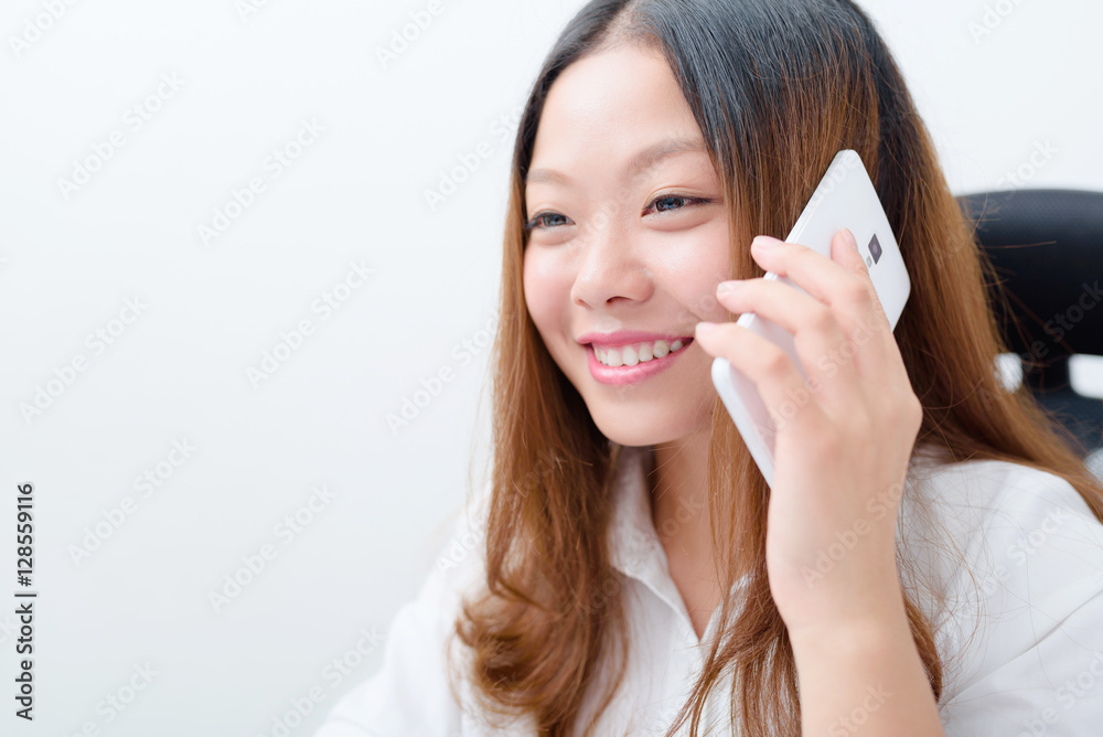 Young business woman using smart phone communicate. Young business woman using smart phone communicate.