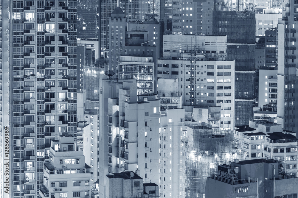 highrise residential buildings in Hong Kong city at night