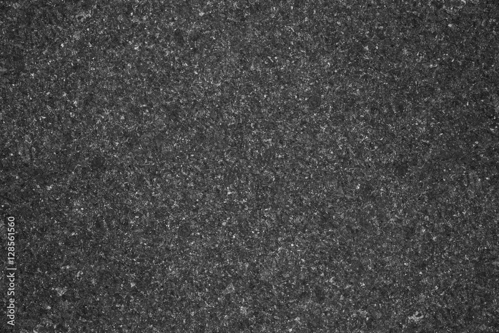 Fototapeta premium Asphalt background texture with some fine grain in it background