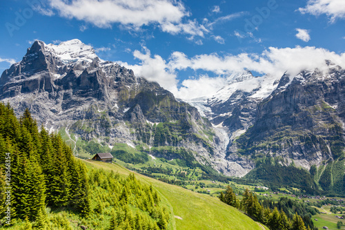 beautiful mountain landscape with wooden house in summer time, G