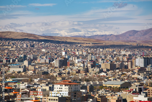 Urmia city aerial view with mountains in the north-west of Iran photo