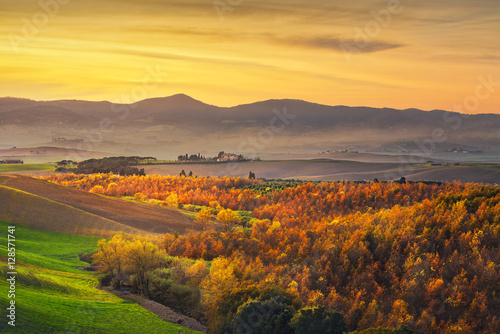 Autumn, panorama in Tuscany, rolling hills, woods, fields Italy 