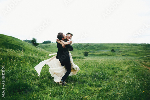 Beautiful newly formed family in nature