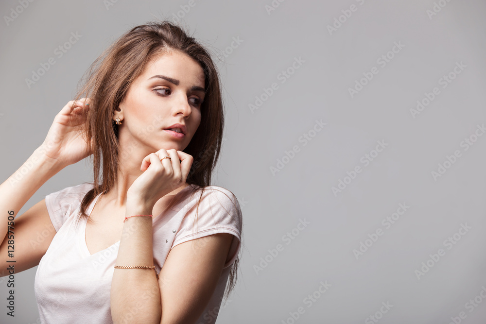 Sensual portrait of beautiful brunette woman posing in studio Sensual portrait of beautiful brunette woman posing in studio