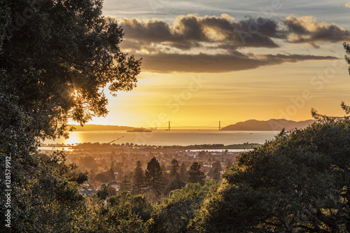 Panorama Golden Glow Sunset of San Francisco Bay looking over East Bay Berkeley