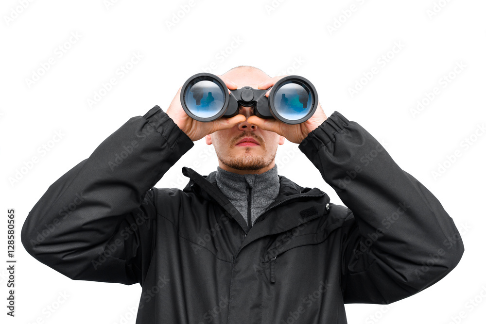 Man turist with binoculars. Young man looking to binocular. Man turist with binoculars. Young man looking to binocular.