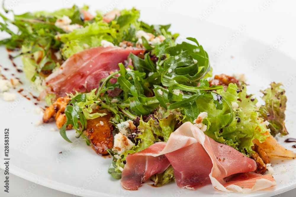 Mixed salad with herbs, prosciutto and parmesan. Mixed salad with herbs, prosciutto and parmesan.