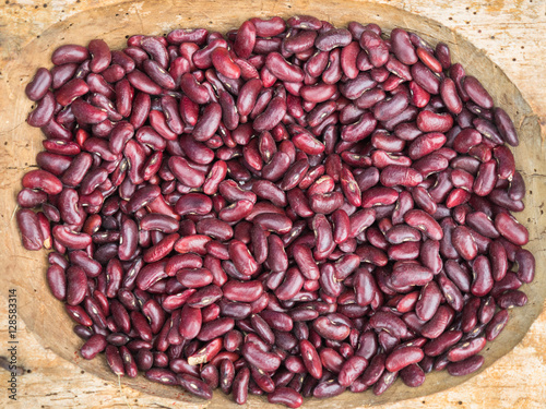 Background of the red shelled beans at the market close up. Shelled beans pattern close up.