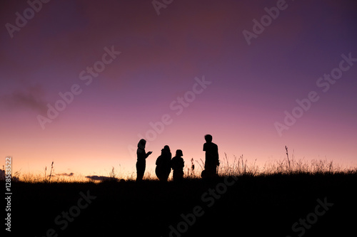 silhouette people on top of mountain © golfnmd50
