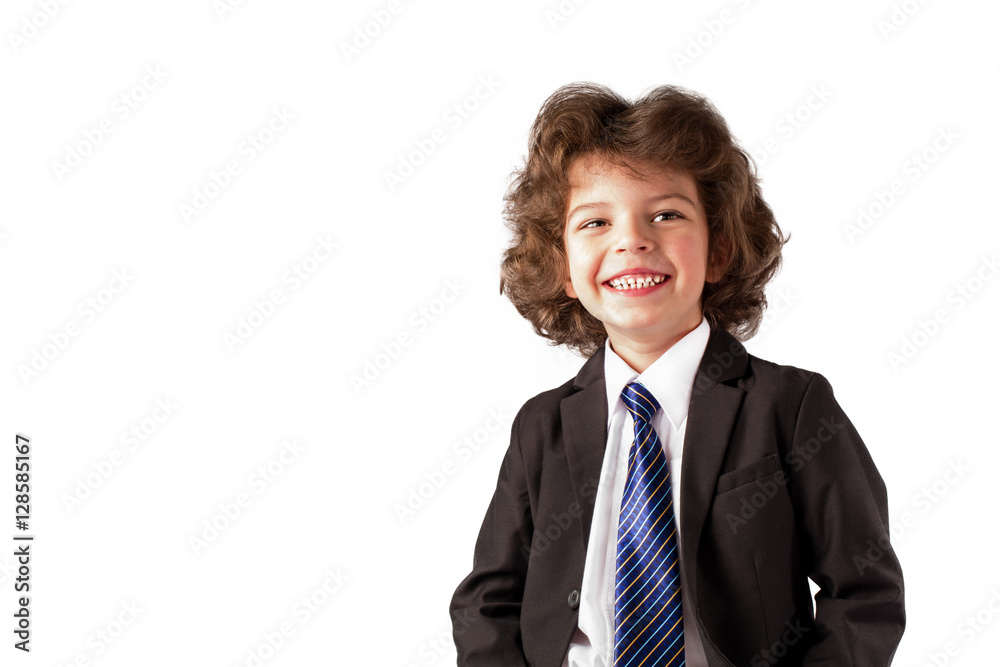 Cute little boy smiling at the camera. White background.