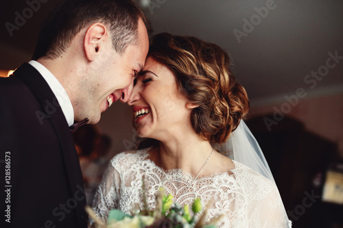 Sincere smiles of the bride and a groom