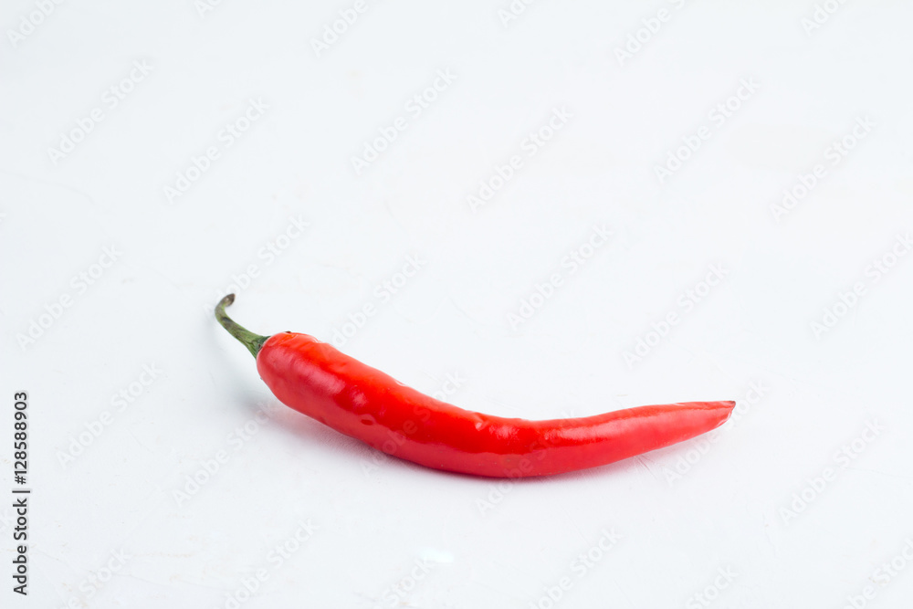 Red chili peppers on a white background closeup