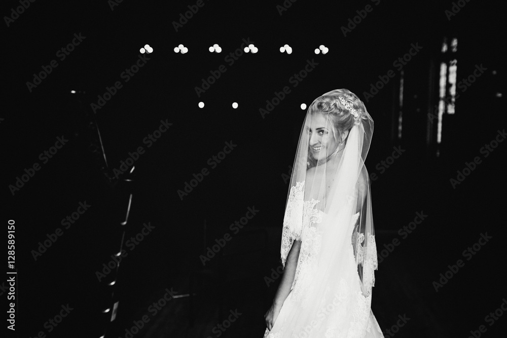 Charming smile of the bride in the white lace dress Charming smile of the bride in the white lace dress