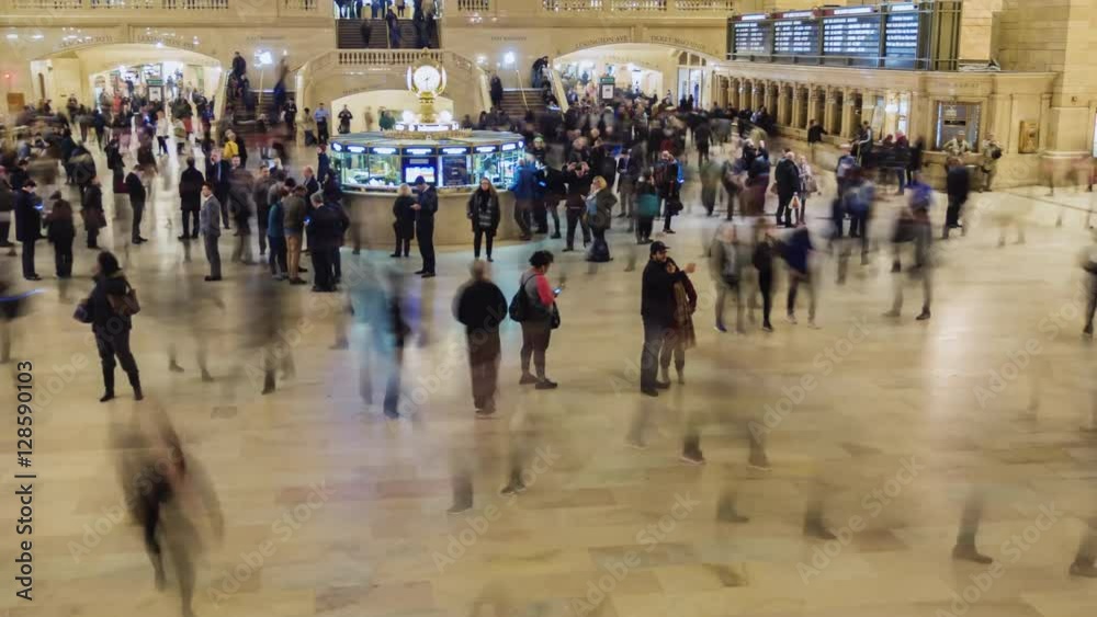 Motion pan timelapse: Grand Central Station in New York City time lapse with blurred crowd people.