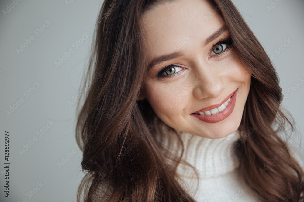 Close up smiling woman in sweater Close up smiling woman in sweater