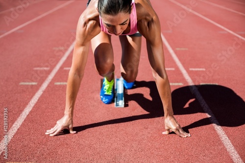 Female athlete ready to run 