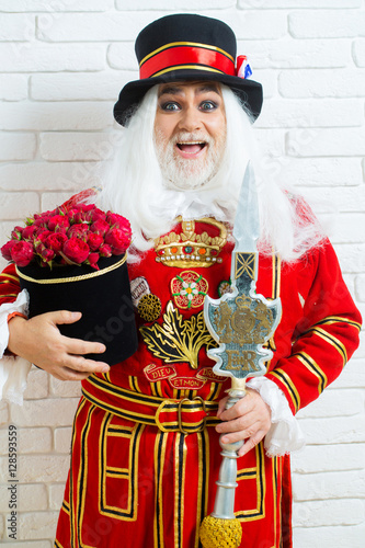 Amazed senior beefeater man photo