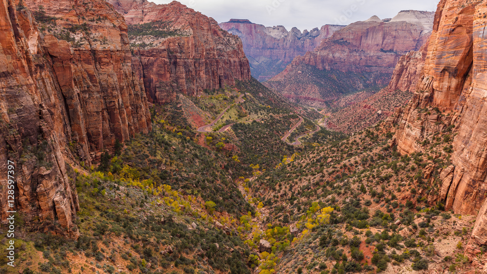 Naklejka premium Highway among the rocks. Amazing mountain landscape. Breathtaking view of the canyon. Zion National Park, Utah, USA