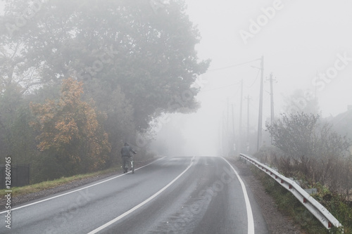 Rural foggy road background
