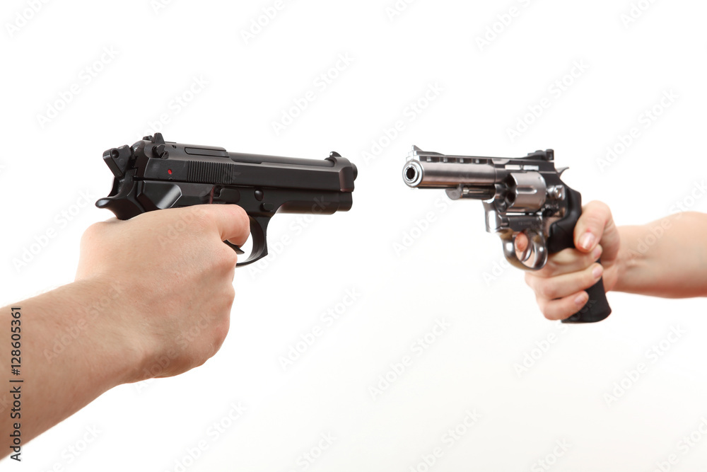 two white hands hold gun isolated on white background two white hands hold gun isolated on white background