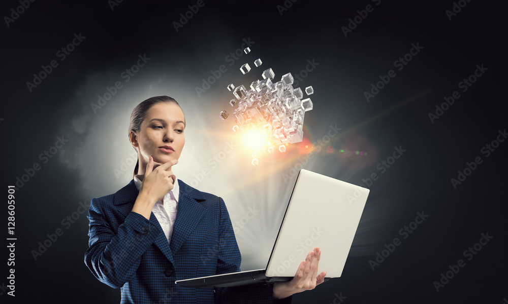 Elegant businesswoman thinking something over . Mixed media Elegant businesswoman thinking something over . Mixed media