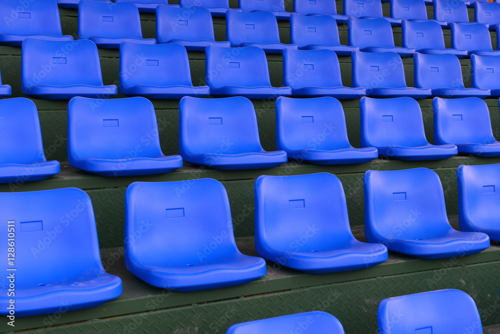 lines of blue stadium seats lines of blue stadium seats