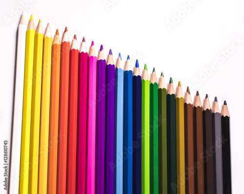 Coloured pencils lined up in a descending fashion
