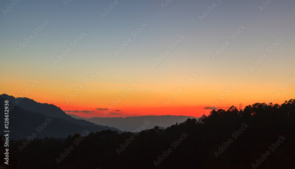 Tropical sunset background against Doi Luang, Thailand