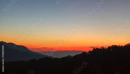 Tropical sunset background against Doi Luang, Thailand