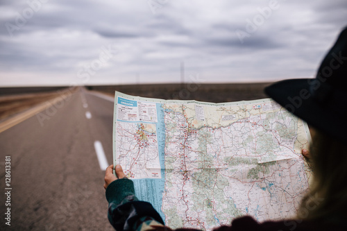 A woman looking at map