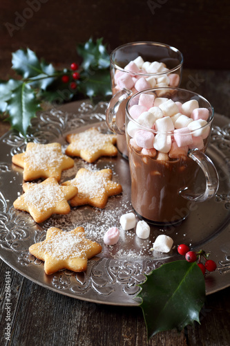 Christmas cookies and two cups of hot chocolate  with marshmallo photo