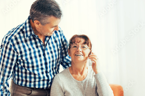 Senior couple enjoying photo