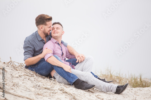 Close up image of a same sex or Gay male couple being loving and © Dewald