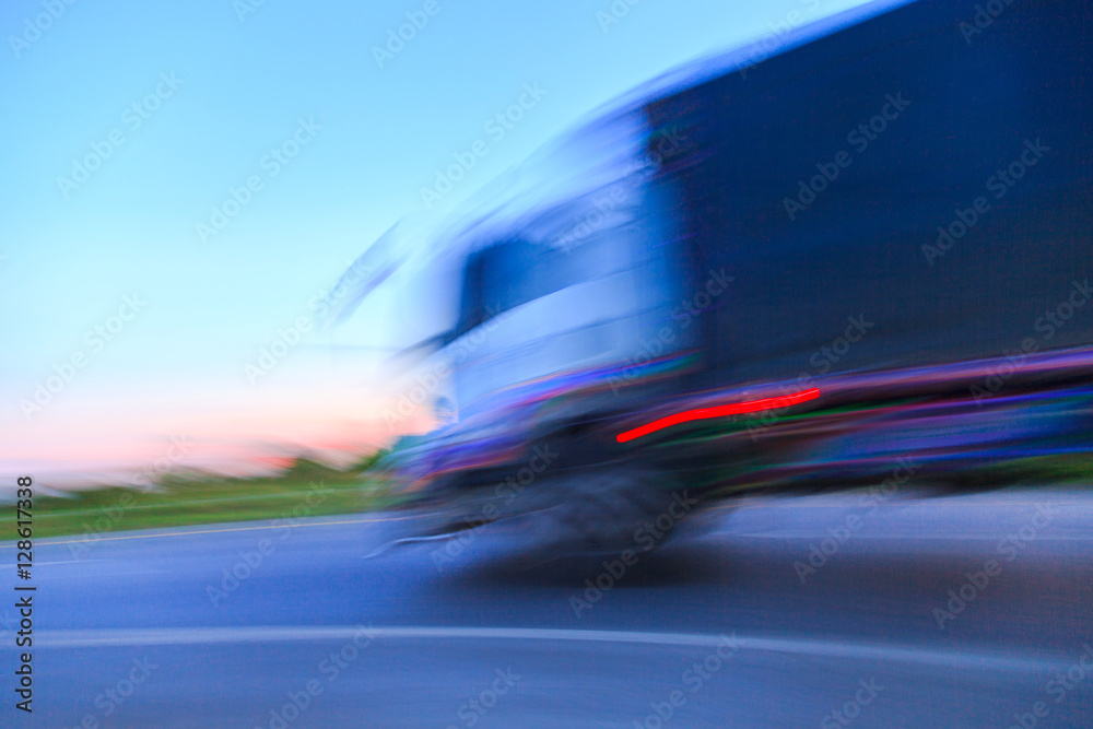 Motion Blur of Truck on Highway at twilight
