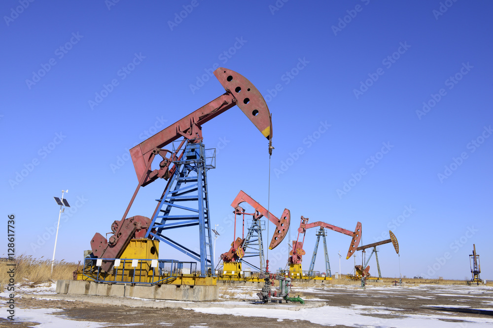 The beam pumping unit is homework, in the snow