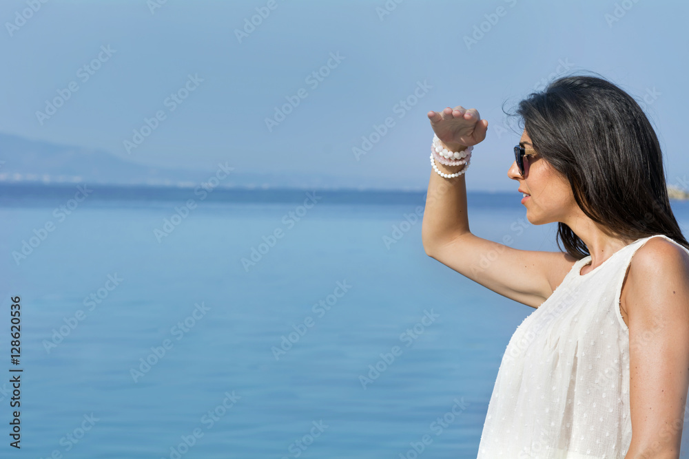 beautiful woman with white dress on a tropical beach sea background beautiful woman with white dress on a tropical beach sea background