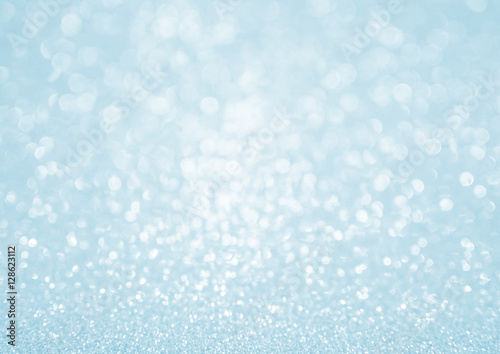abstract blue Bokeh circles for Christmas background, glitter light Defocused and Blurred Bokeh © Phimchanok