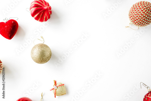 christmas decoration with christmas glass balls, tinsel, bow. christmas wallpaper. flat lay, top view