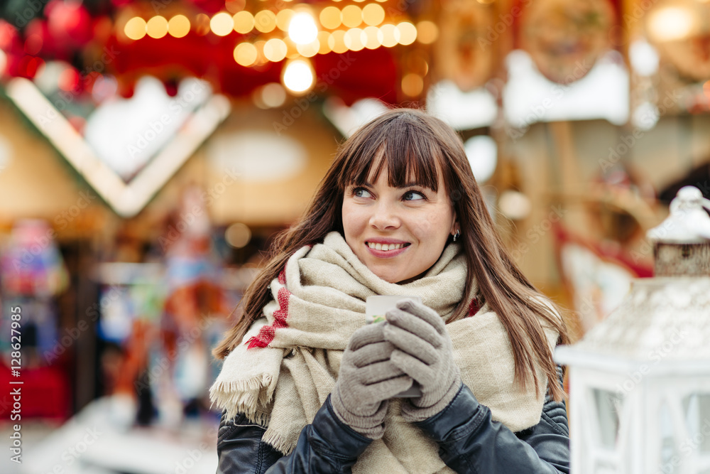 beautiful woman drinks mulled wine on christmas market beautiful woman drinks mulled wine on christmas market