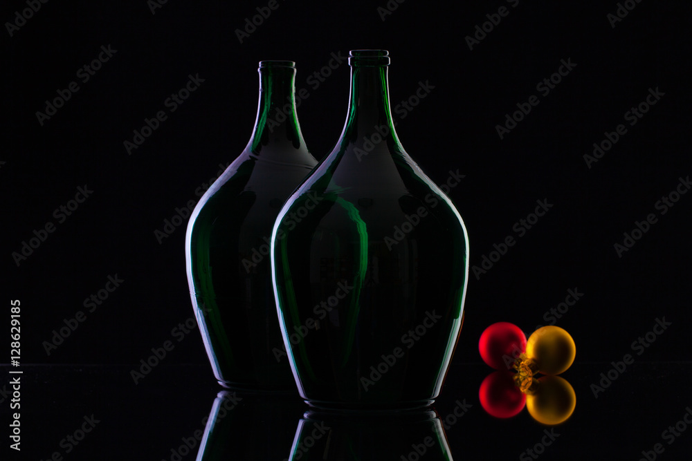 Silhouette of elegant and very old wine bottles and Christmas dec