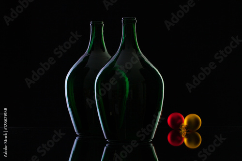 Silhouette of elegant and very old wine bottlesand Christmas dec
