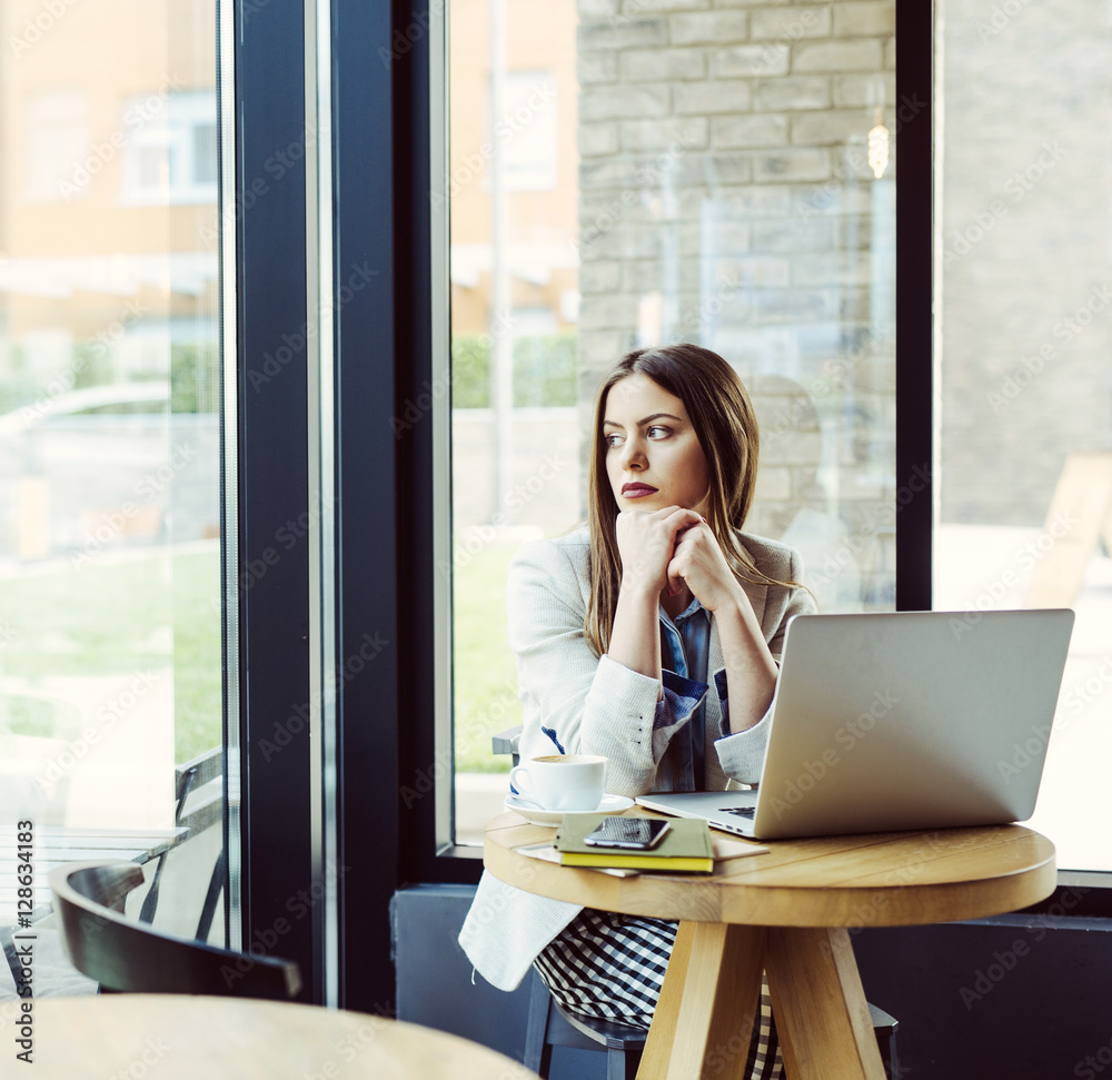 Beautiful Young Woman Sitting in Coffee Shop Beautiful Young Woman Sitting in Coffee Shop