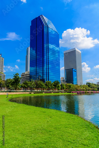 Bangkok city on blue sky with cloud at Benchakitti Park,Thailand