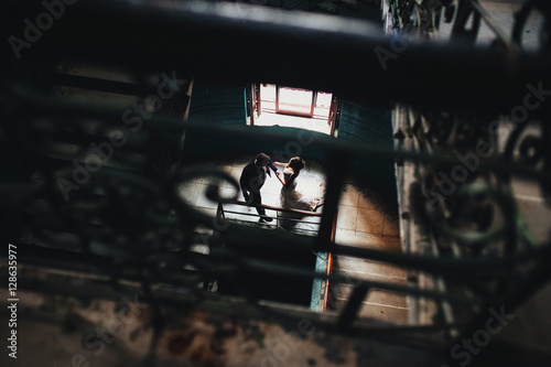 Happy newlyweds in an old house