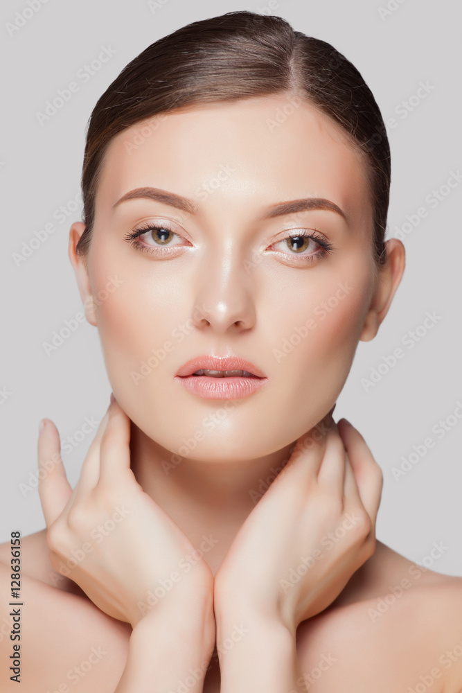 Fototapeta premium Fashion woman with beautiful face - isolated on white. Skin care concept.