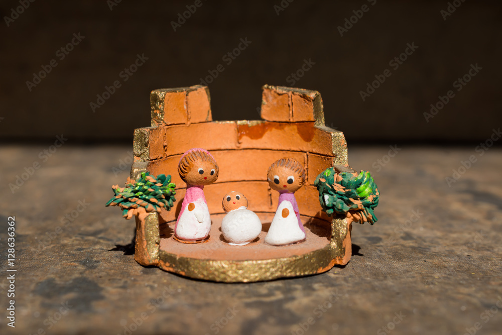 Nacimiento navideño artesanal de arcilla. Stock Photo | Adobe Stock