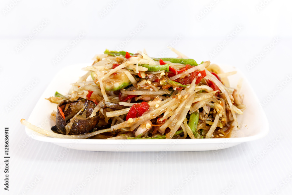 Thai food papaya salad on white dish