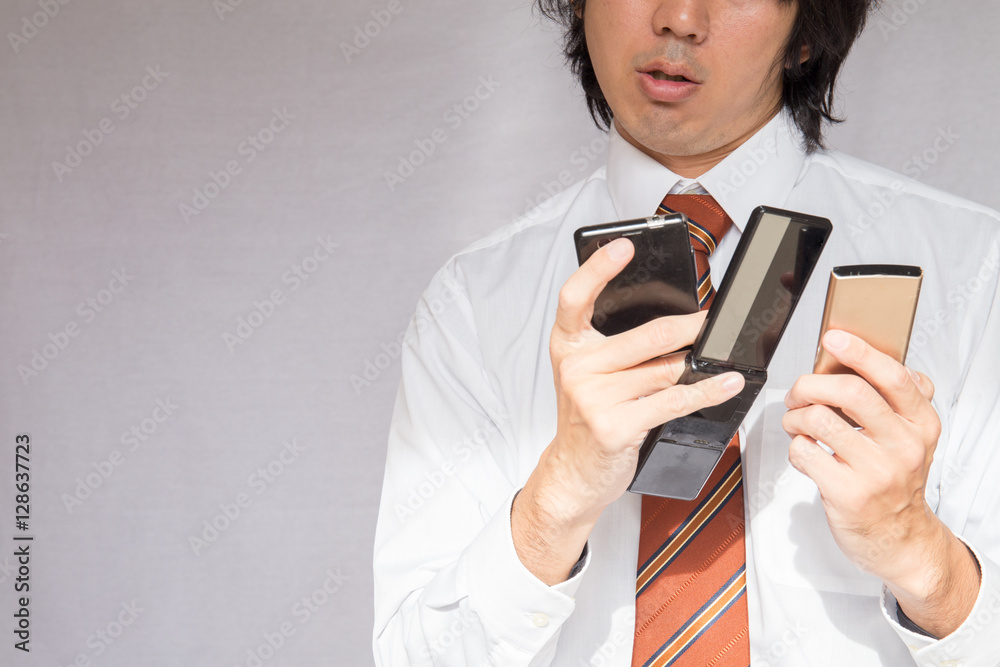 Businessman, Smart phone, Handyphone,Three operation Businessman, Smart phone, Handyphone,Three operation
