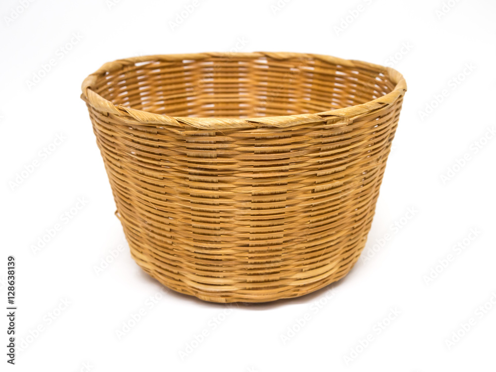 Empty brown wicker woven basket isolated