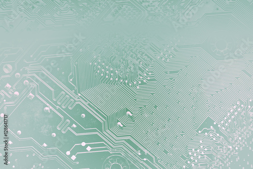 Billede på lærred Circuit board or motherboard toned into light transparent silhouettes in blue colors
